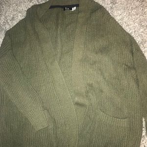 Green open sweater